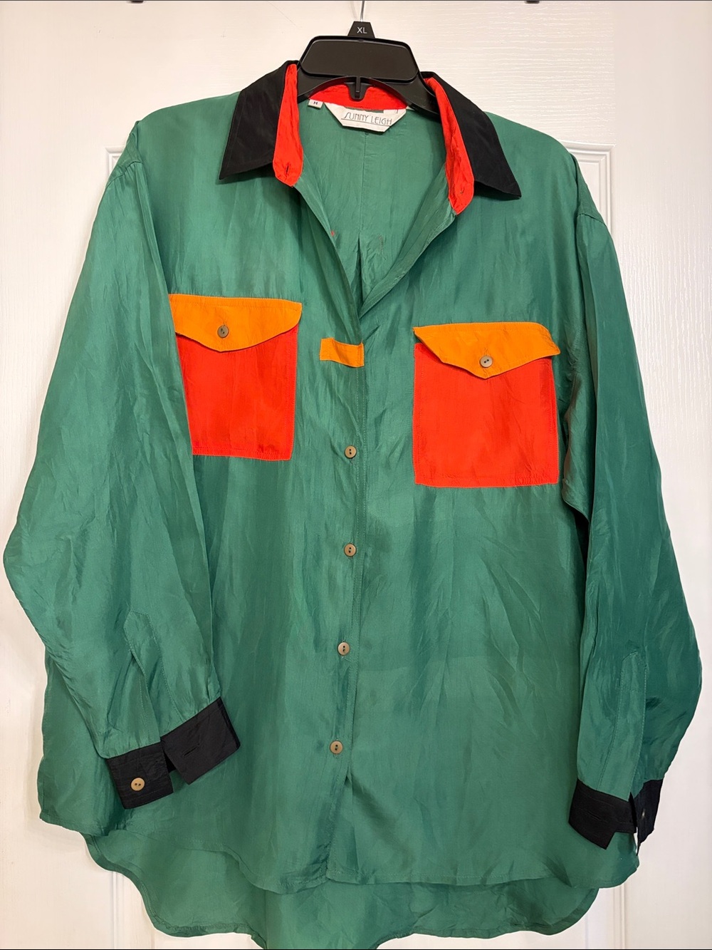 Sunny Leigh Green Button-Up blouse.
